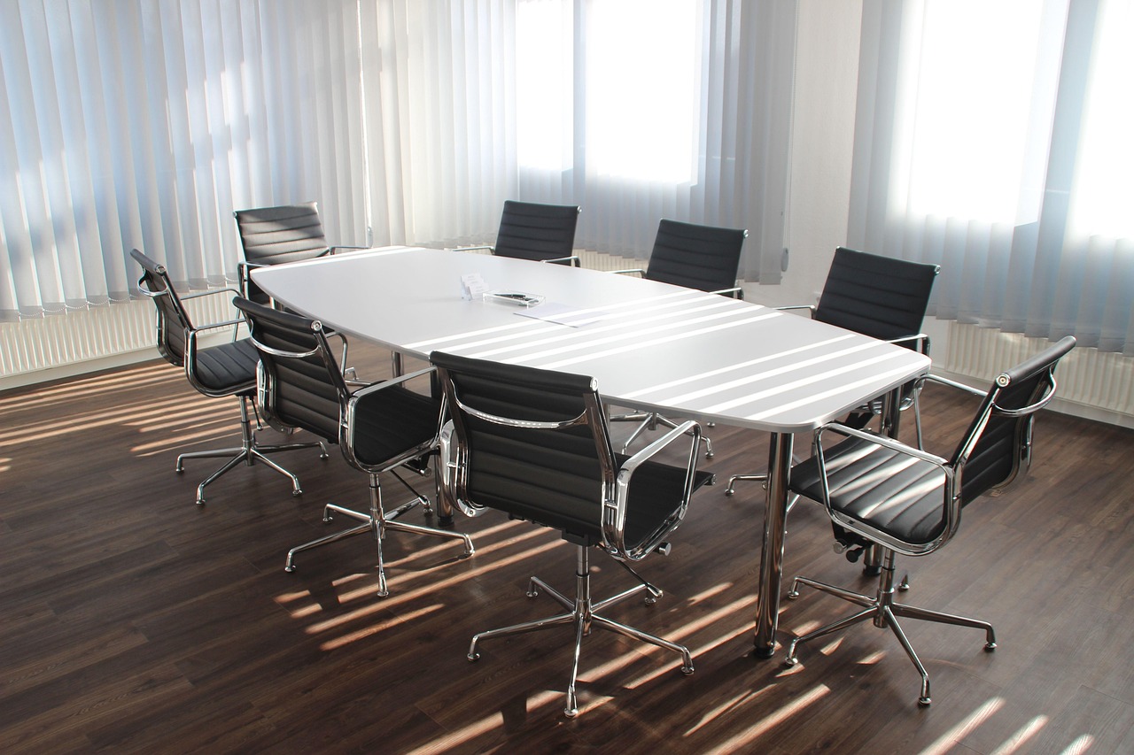 Clean boardroom prepared for project coordination.